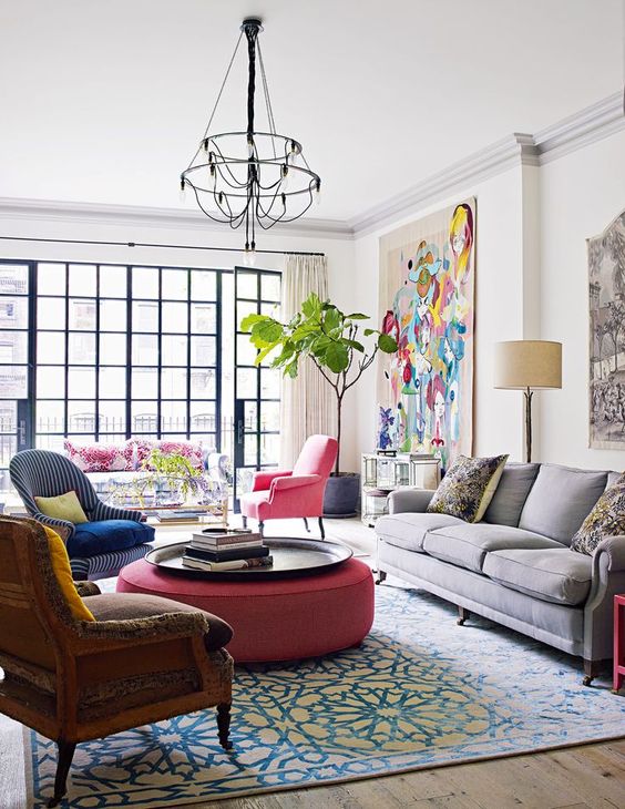 Cover feature, home of Jos and Annabel White in Manhattan, West Village, town house, modern, sitting room, window, ottoman, tapestry, pink chair, chandelier
