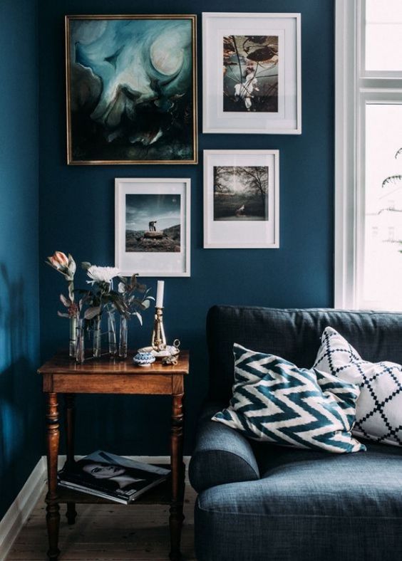 6 Interiors that prove dark walls + wood is that stylish combo we love right now