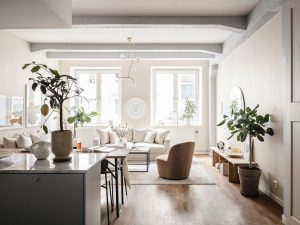 Warm Scandinavian apartment with baby blue kitchen