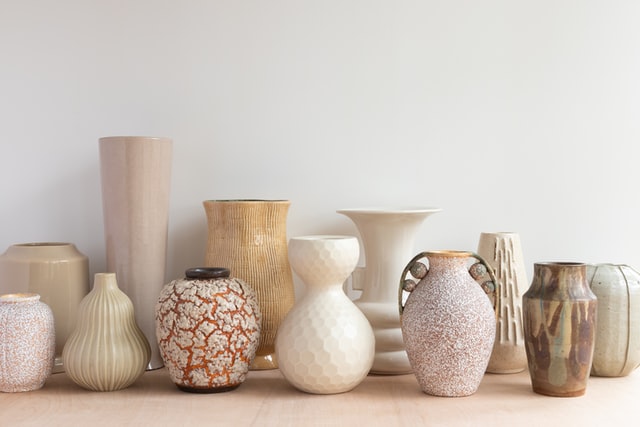 How to use antique porcelain vases in home decor?